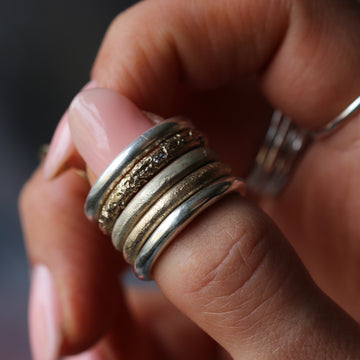 Sand Cast Sterling Silver Ring with Moissanite Stones