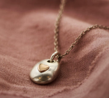 Ashes pebble necklace with 9ct gold heart 