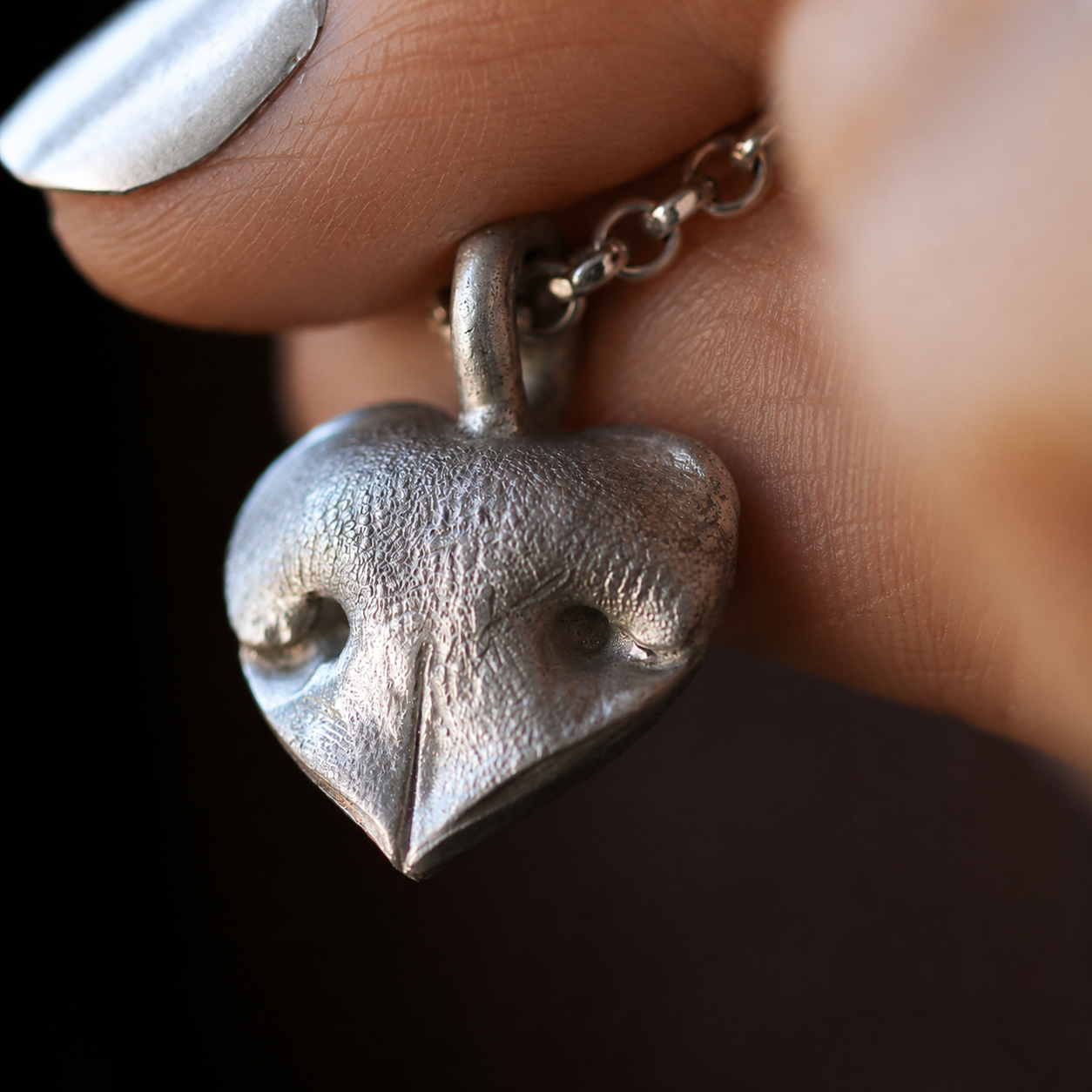 Silver Snozza Regular Heart Dog Nose Impression Necklace showing the heart-shaped pendant and preserved nose texture.