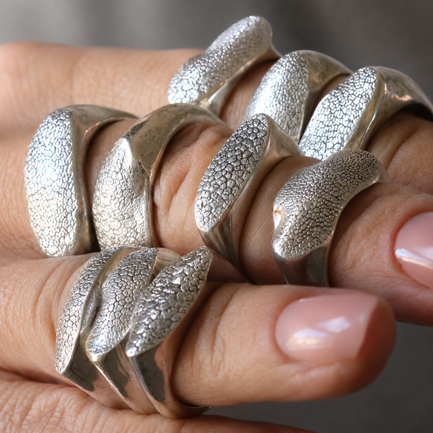 Silver Snozza™ Dog Nose Impression Ring – Collection of one-of-a-kind Silver Snozza Dog Nose Impression Rings handcrafted from different dogs' impressions.