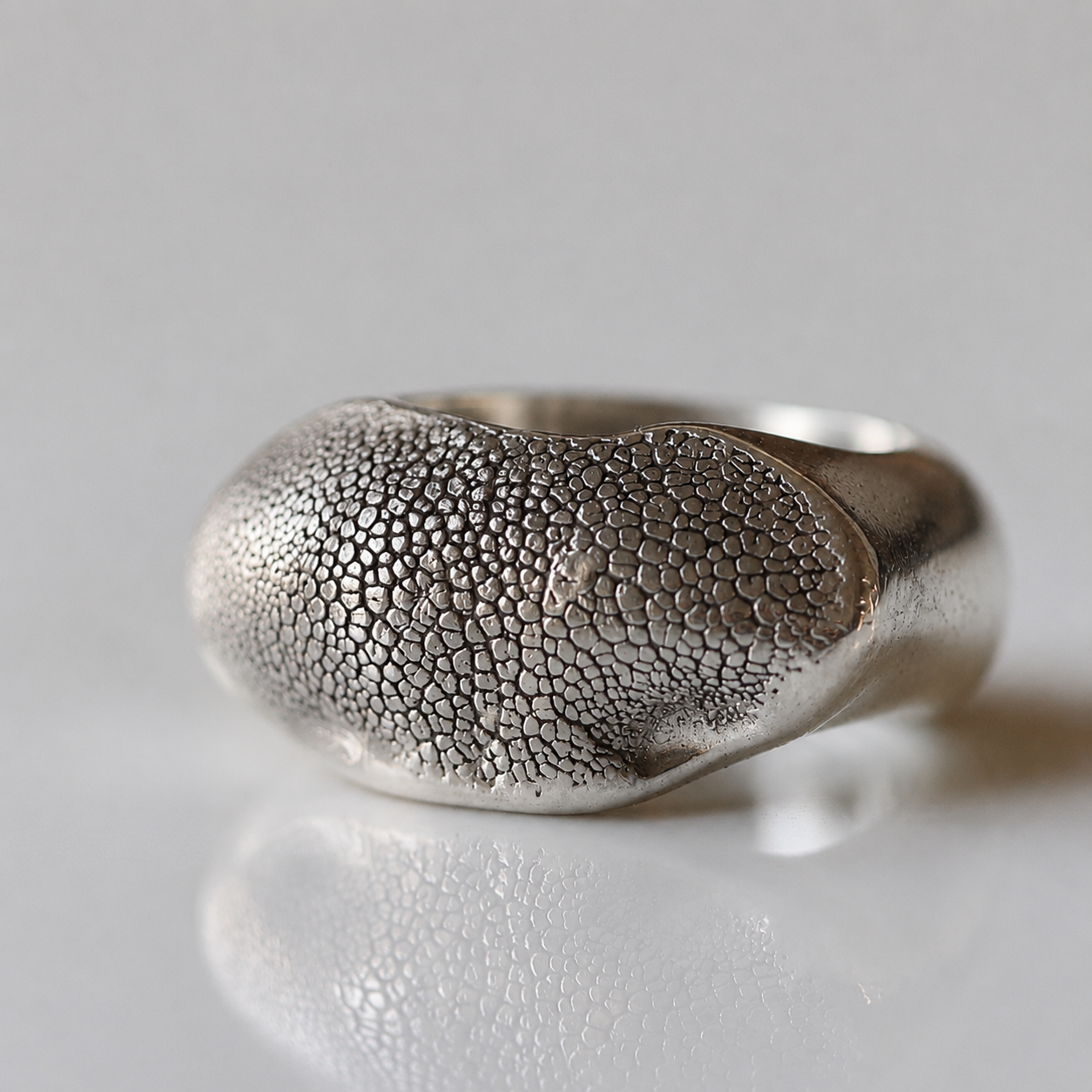 Silver Snozza Dog Nose Impression Ring showing dog nose texture in sterling silver.