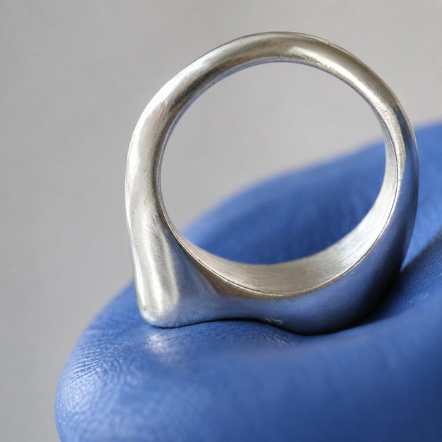 Silver Snozza™ Dog Nose Impression Ring – Silver Snozza Dog Nose Impression Ring fitting perfectly into the original life-size impression used to create it.
