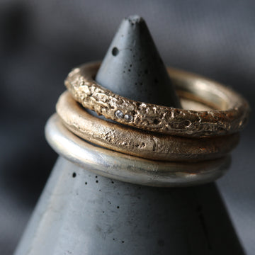 Sand Cast Gold Ring with Moissanite Stones