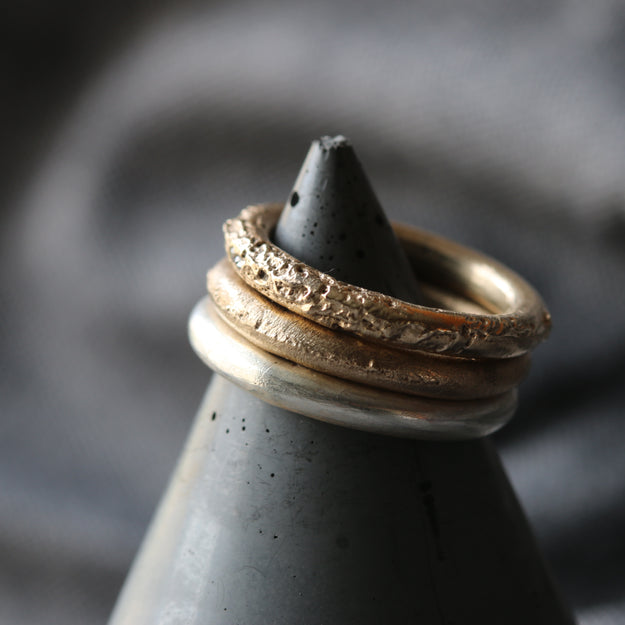 Sand Cast Gold Ring with Moissanite Stones