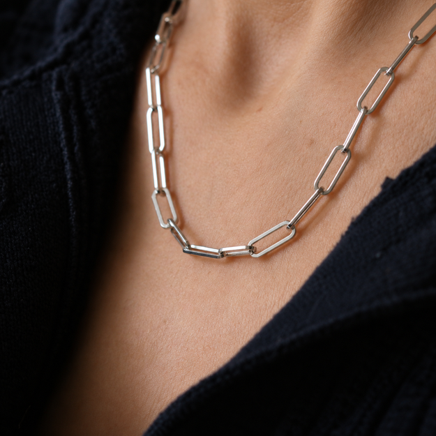Sterling silver paperclip chain, 3.7 mm wide, worn at the neck