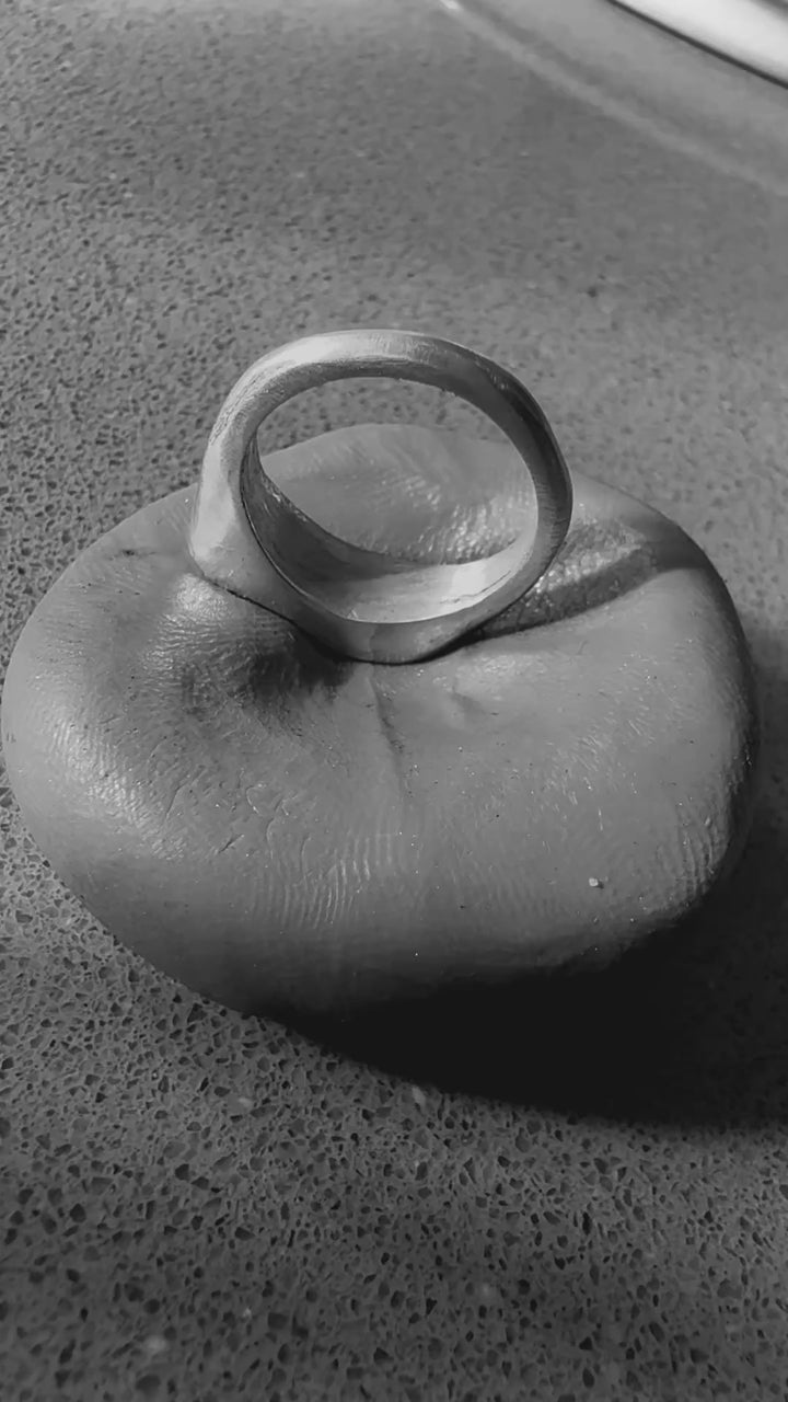 Label: From a dog nose impression to a Snozza ring. Fuller design shown.