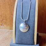 Hammered circle necklace