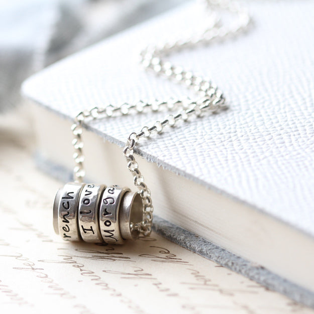 Silver Spinning Ring Necklace - Image 4
