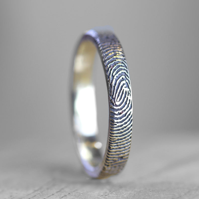 Slender silver fingerprint ring