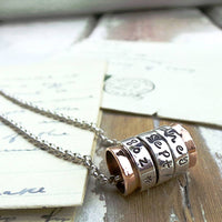 Silver and Copper Spinning Ring Necklace
