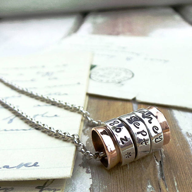 Silver and Copper Spinning Ring Pendant