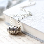 Silver and Copper Spinning Ring Necklace - Image 4