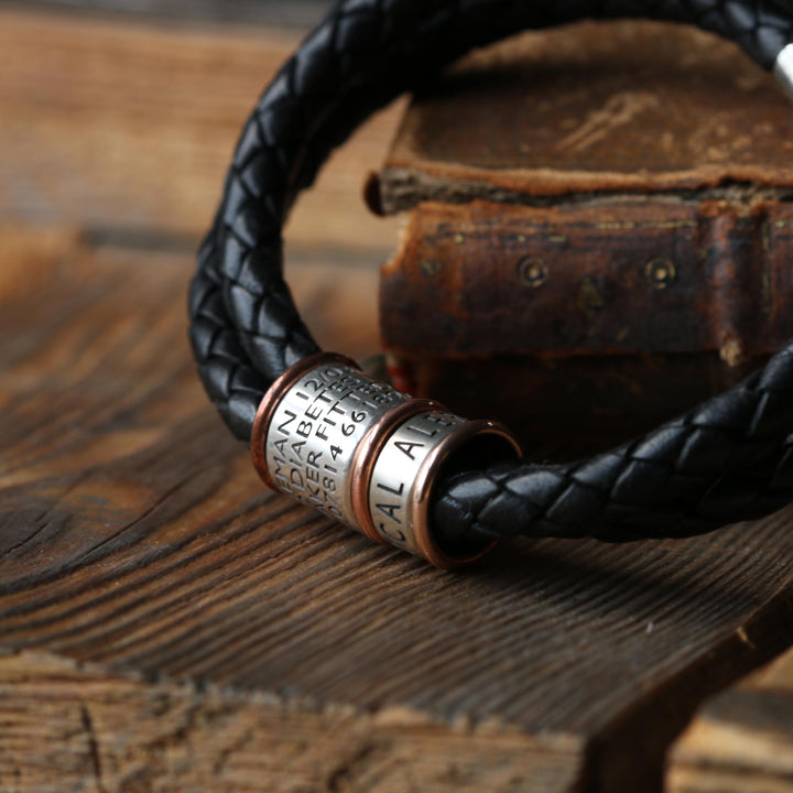 Black braided leather bracelet with silver medical alert beads and copper rings